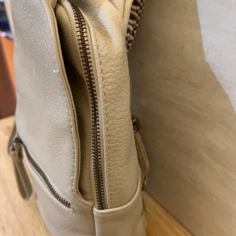Urban Expressions Liberty leather sling bag with a chevron pattern strap. - Picture 6 of 16